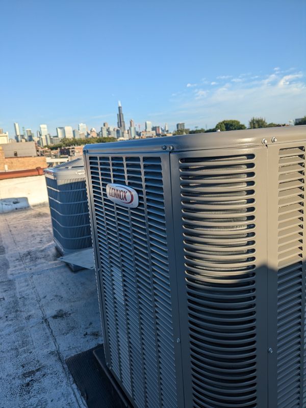 Air conditioning unit being serviced
